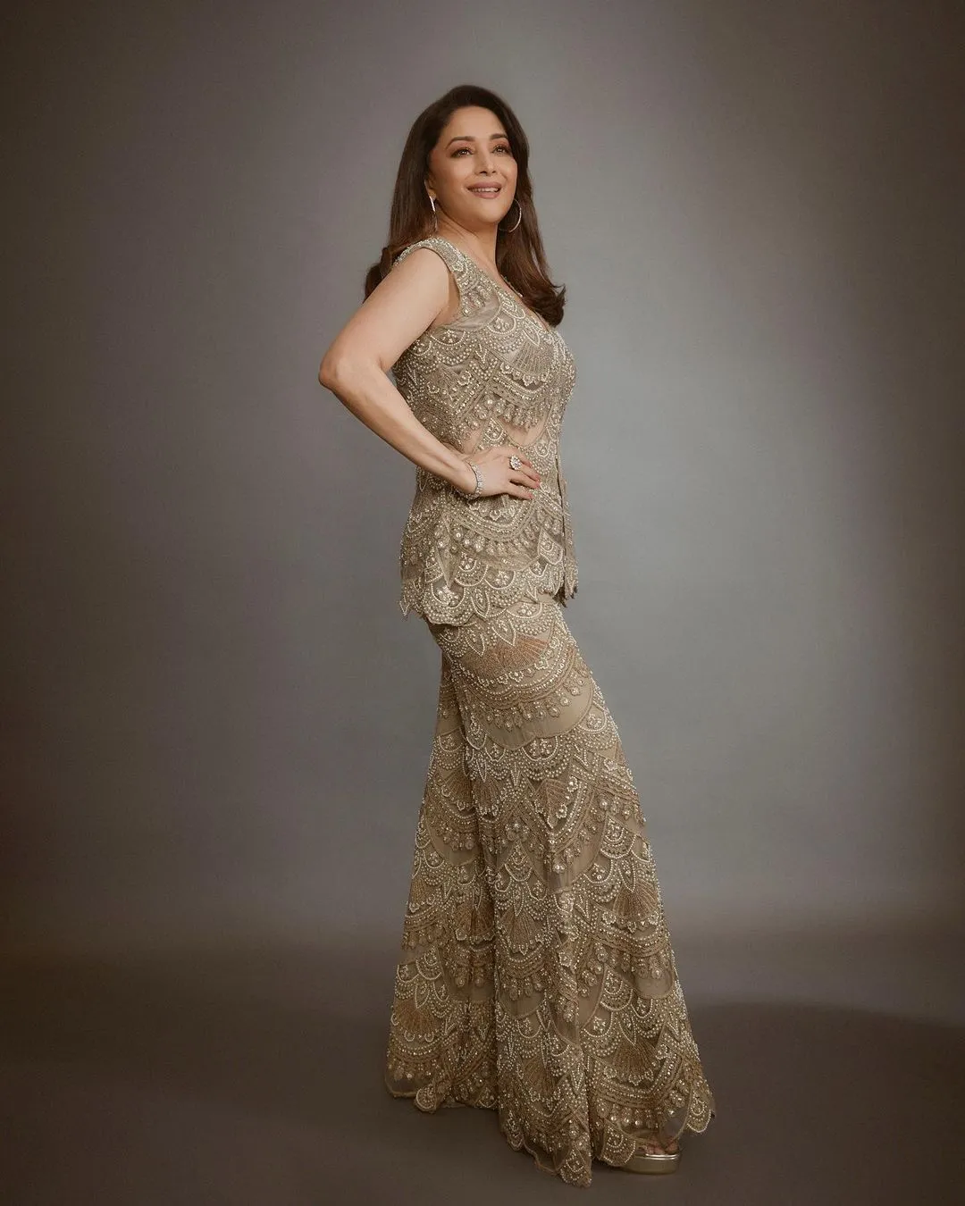 MADHURI DIXIT IN GOLD EMBELLISHED GARARA JACKET SET