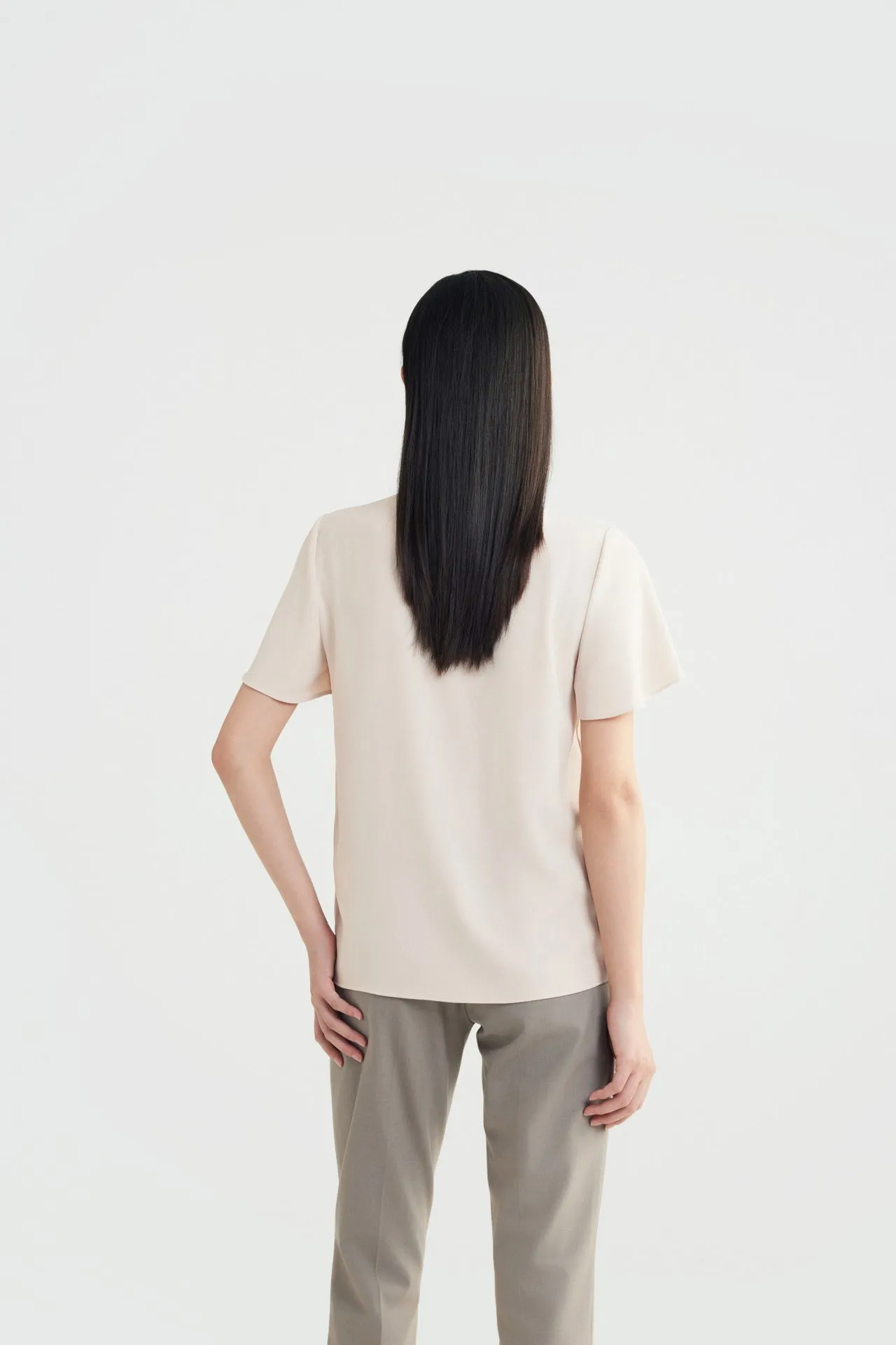 Pleated Stand Collar 
Blouse