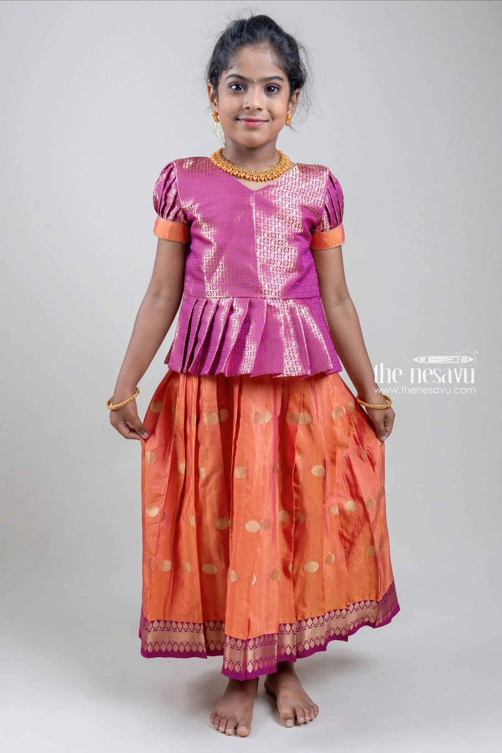 Premium Zari Paisley Designer Pink Silk Peplum Blouse with Knife Pleated yellow Silk Skirt for Girls