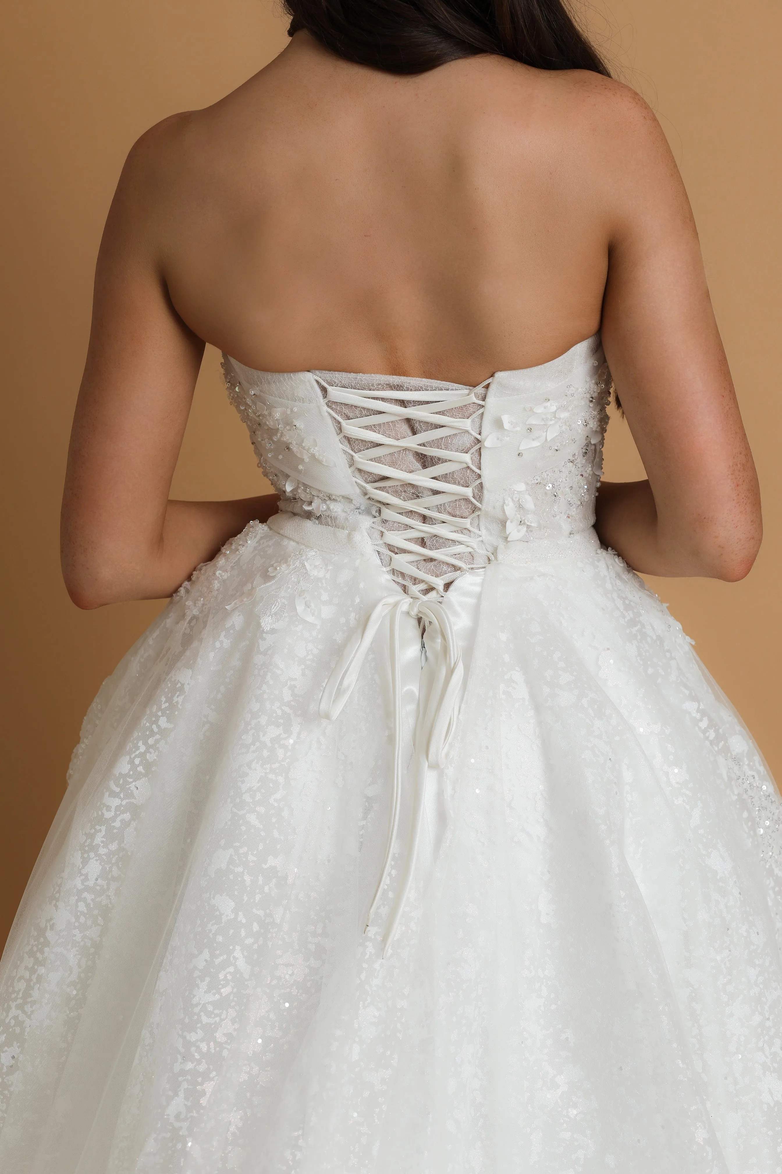 Strapless sparkling straight cut neckline crinoline skirt wedding dress for hire