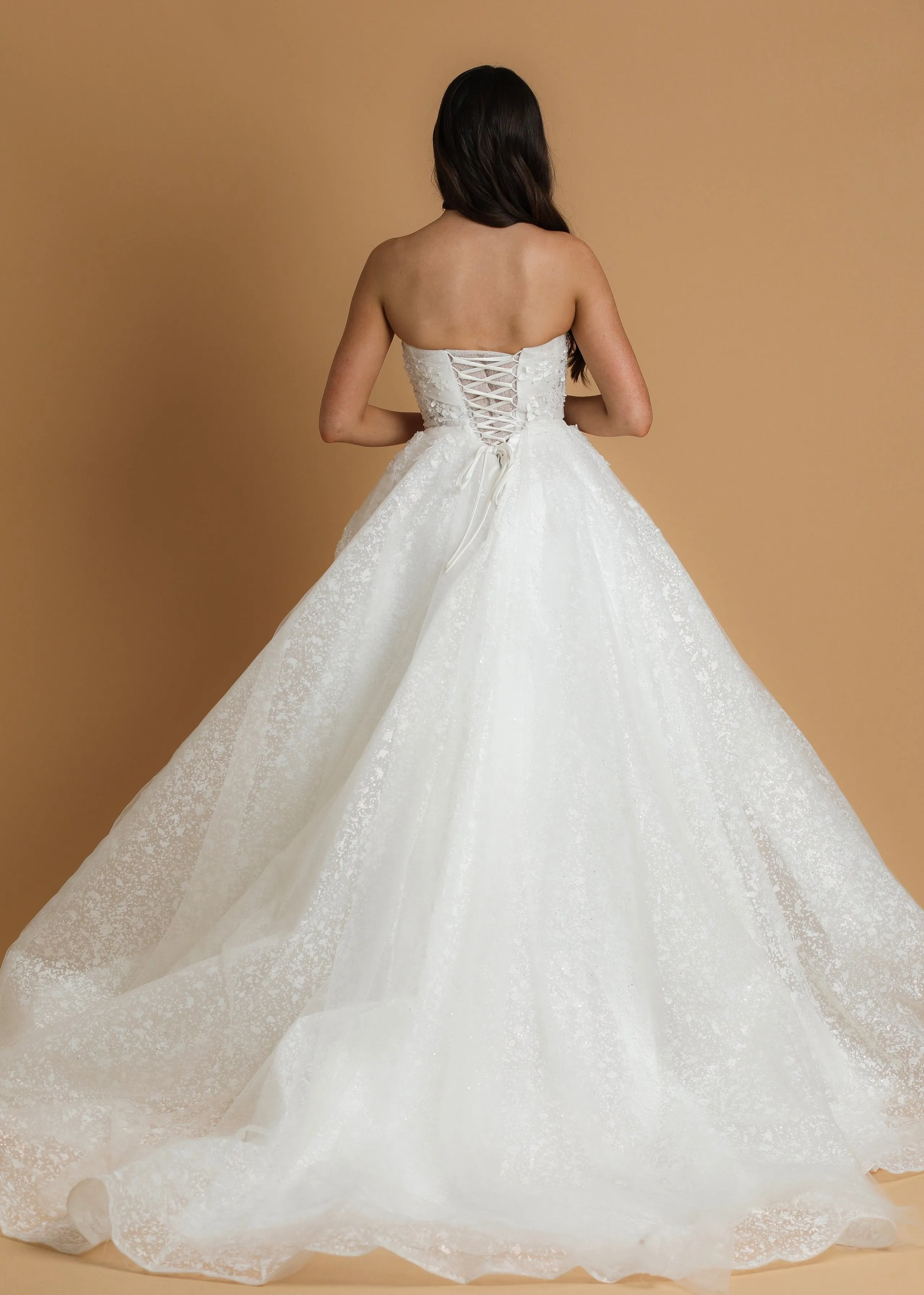 Strapless sparkling straight cut neckline crinoline skirt wedding dress for hire