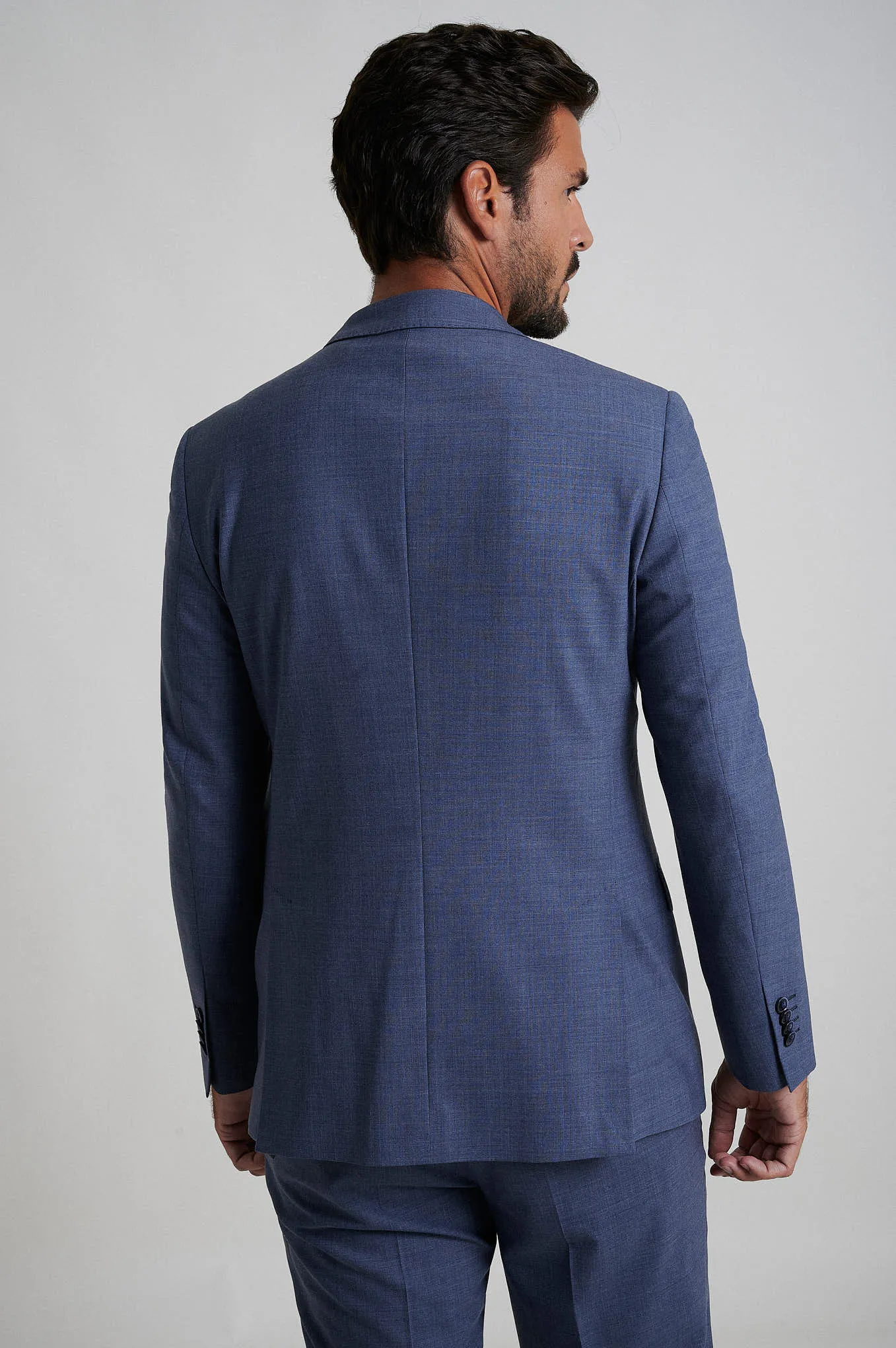 Tailored fit 100% refined wool suit half canvas construction