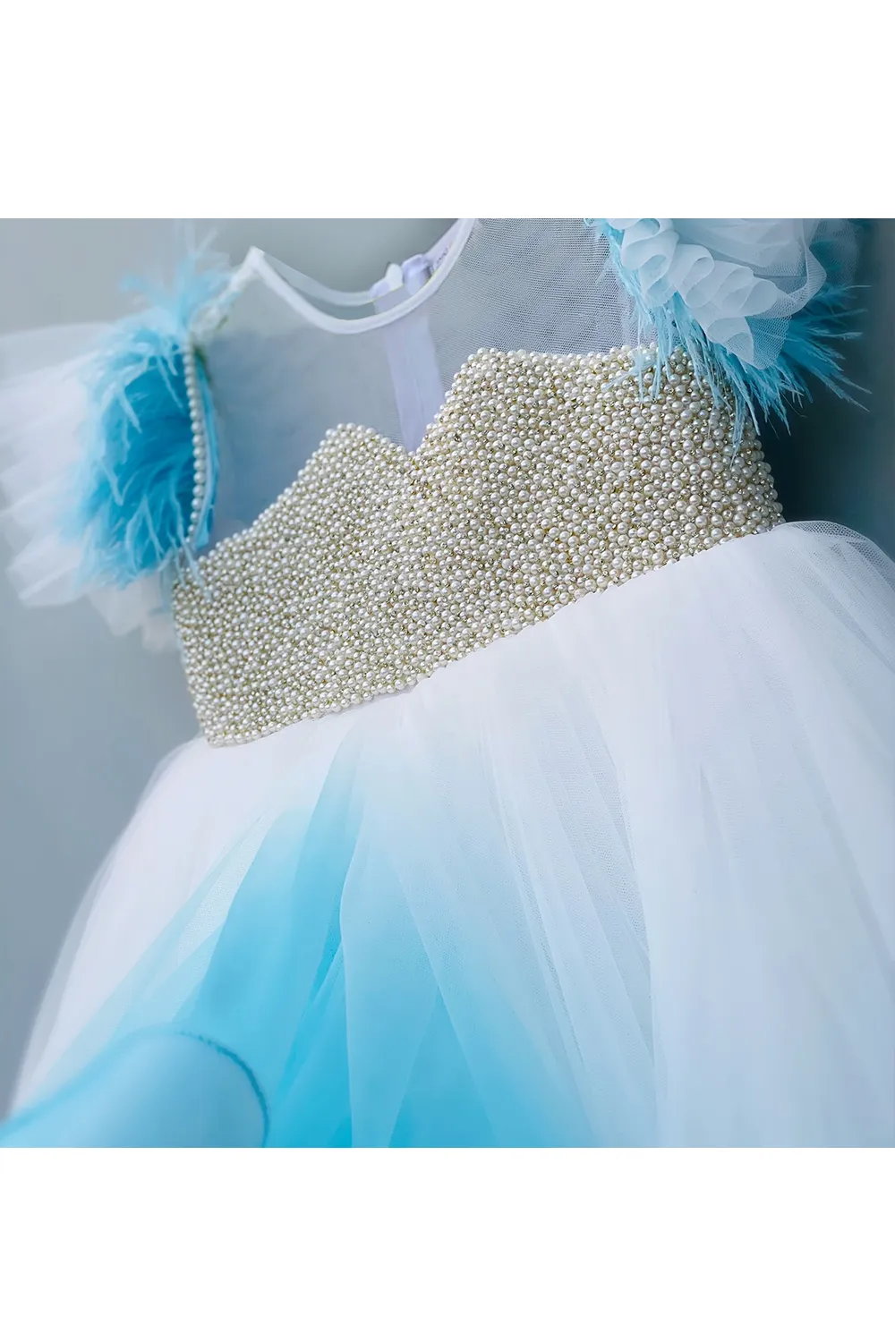 White-blue shaded pearl embroidered high low flared gown
